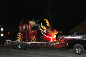 A brightly lit parade float