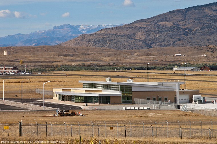 A photo of the Regional Airport with hills in the background