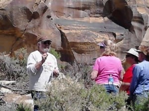 Guide, Larry Todd, explaining petroglyphs at Legend Rock
