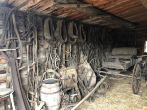 Vintage tools hang on the wall in the Old Trail Town blacksmith shop