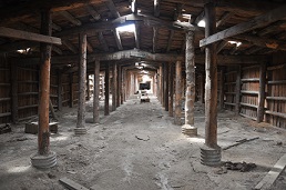The unfinished root cellar used to store produce