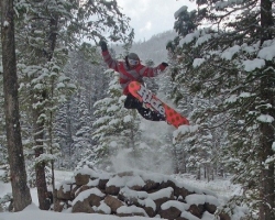 snowboarder jumps into the air