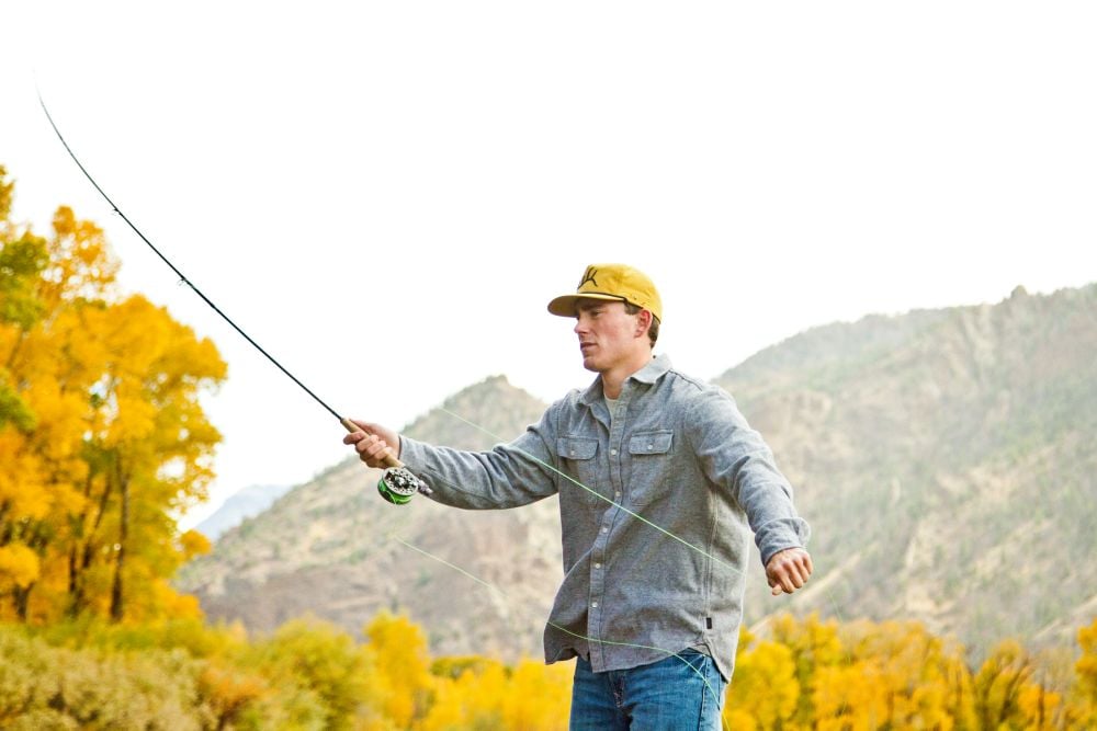 A man fishing near Shoshone River in Cody Yellowstone