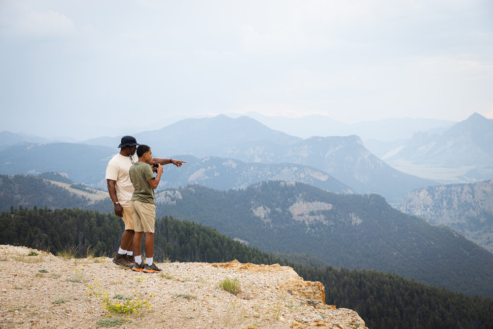 A father and son hike in Cody Yellowstone