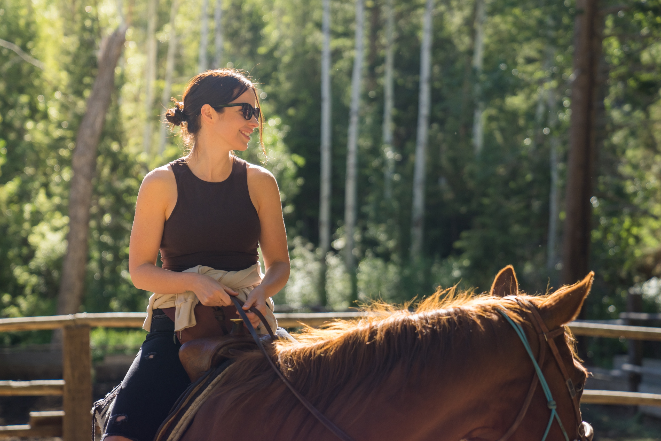 Woman sitting on a horse