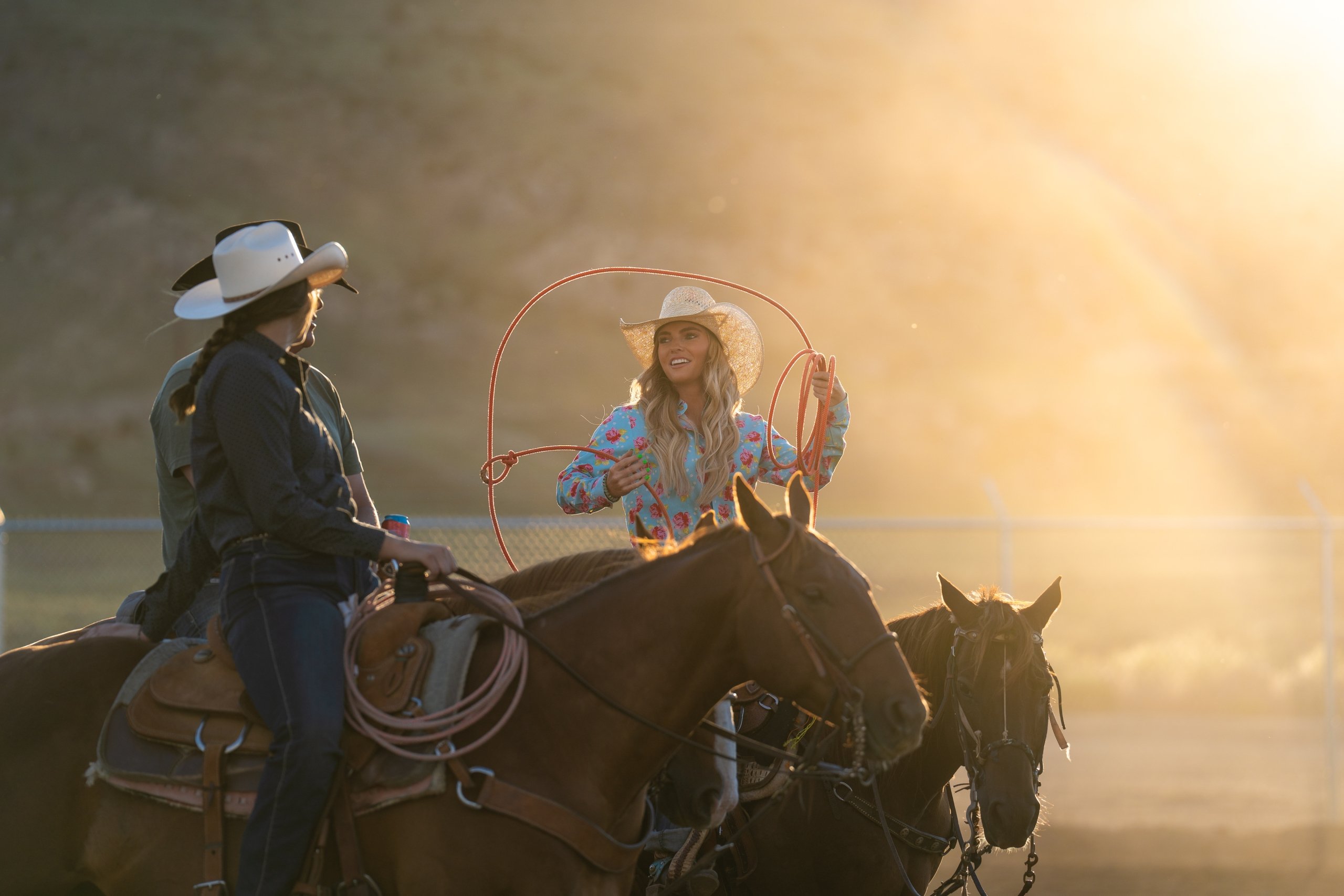Woman on a horse with a lasso