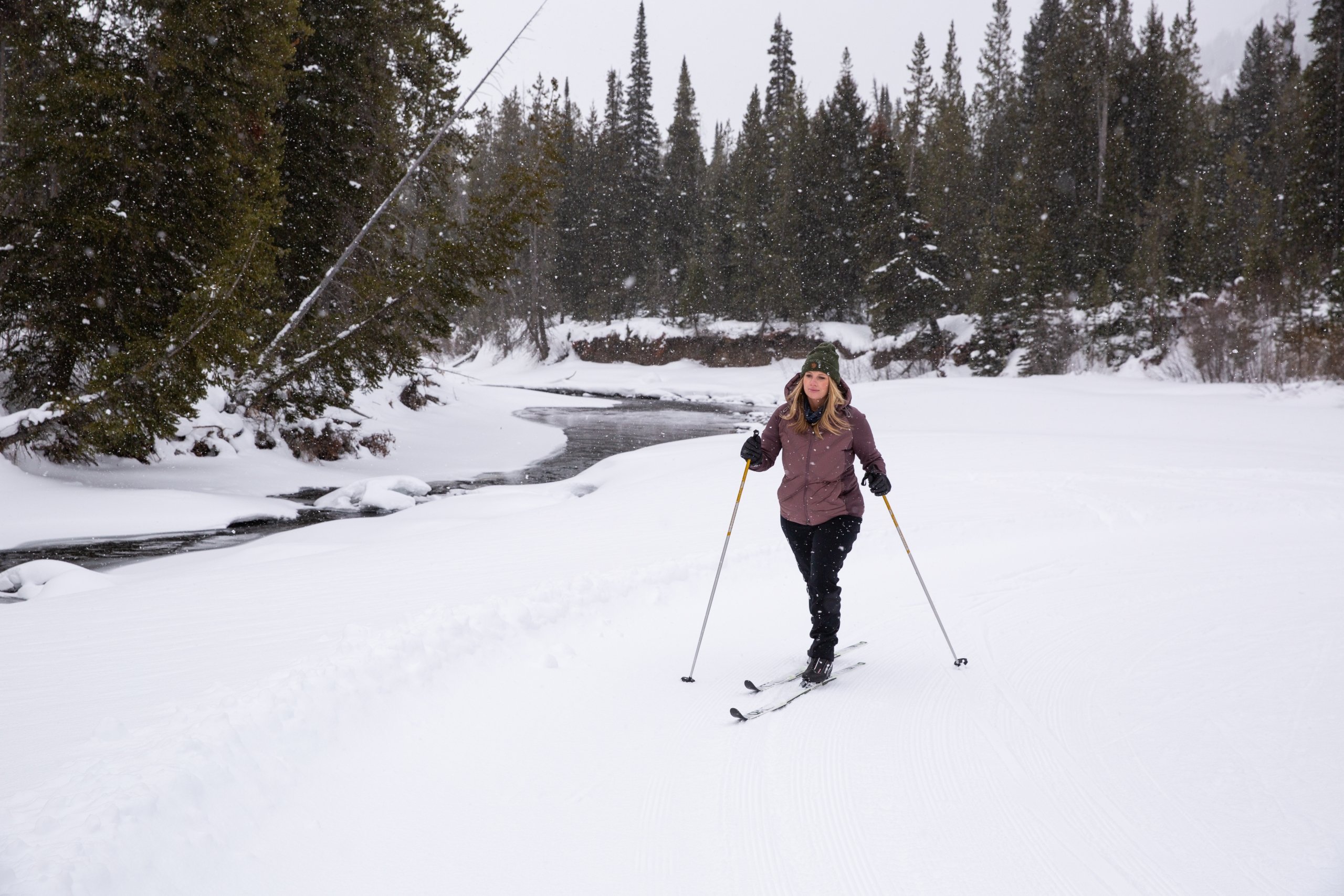 A woman cross country skiing