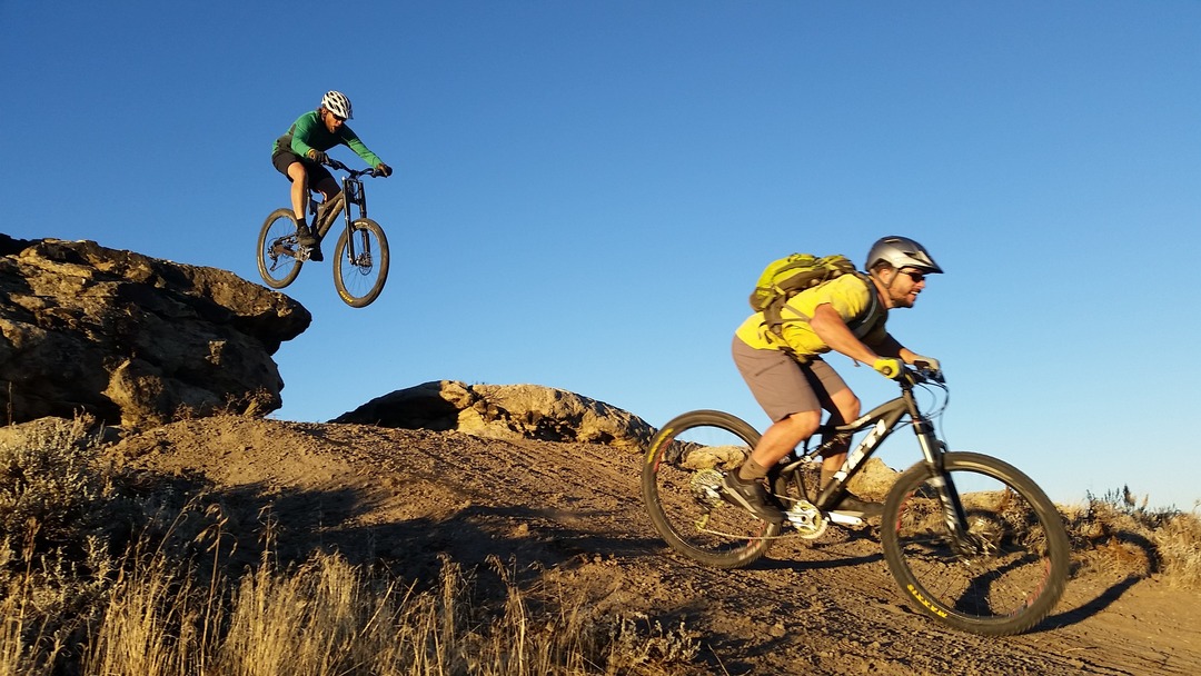 Two men bike at Beck Lake Bike Park