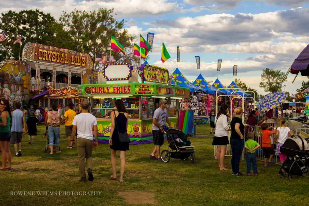 People walking around a fair
