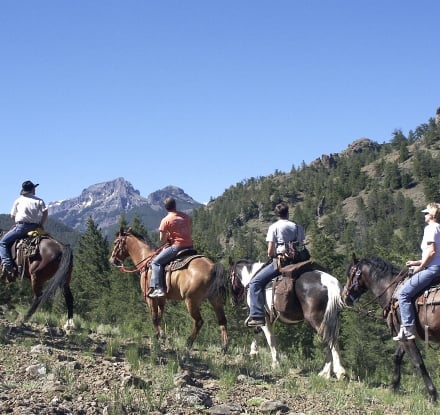 People riding horses in Cody Yellowstone