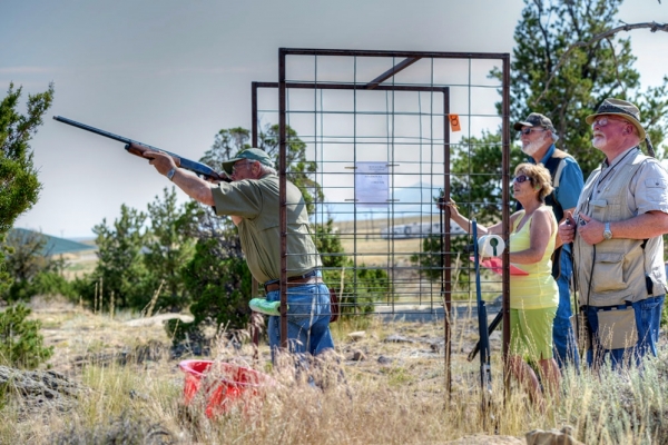 Man taking a shot at target shooting