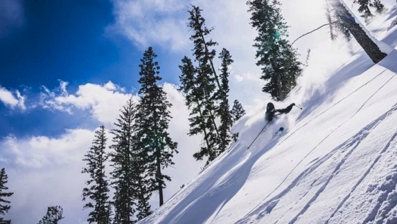 A skier enjoys fresh powder at Sleeping Giant Ski Area