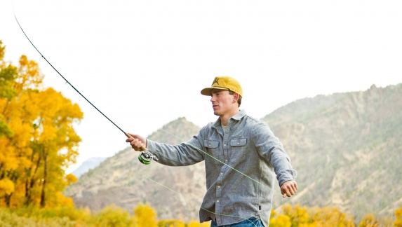 A man fishing in Cody Yellowstone